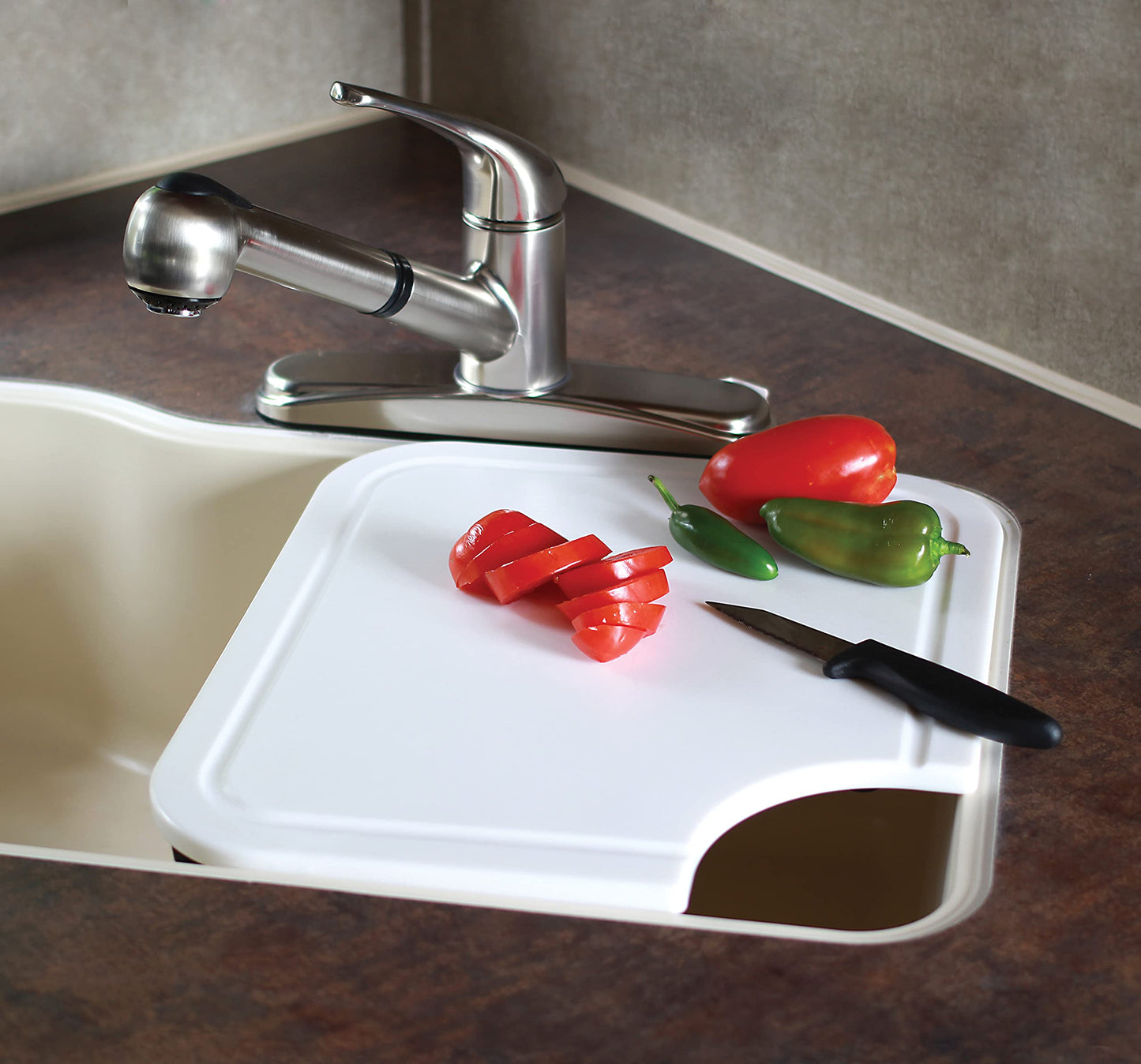 Camco Camper/RV Sink Mate Cutting Board | Features Built-In Juice Groove & Cut Corner for Scrap Disposal | Designed w/Adjustable Rubber Feet for Different Sink Sizes | Expand Kitchen Workspace (43857)