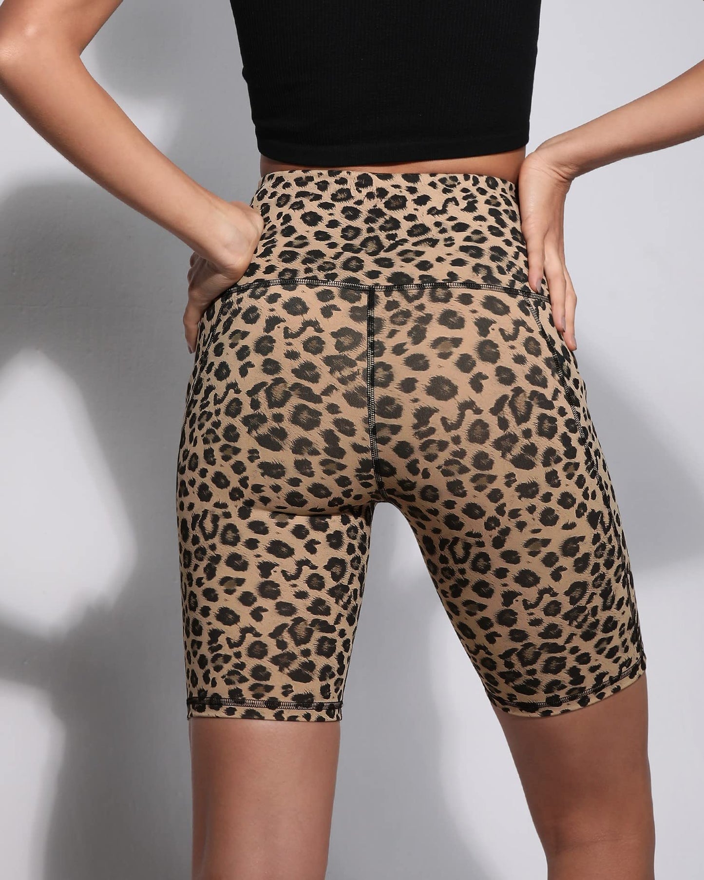 ODODOS 8" Tummy Control Biker Shorts for Women with Pockets High Waist Running Workout Athletic Yoga Shorts, Leopard, Medium