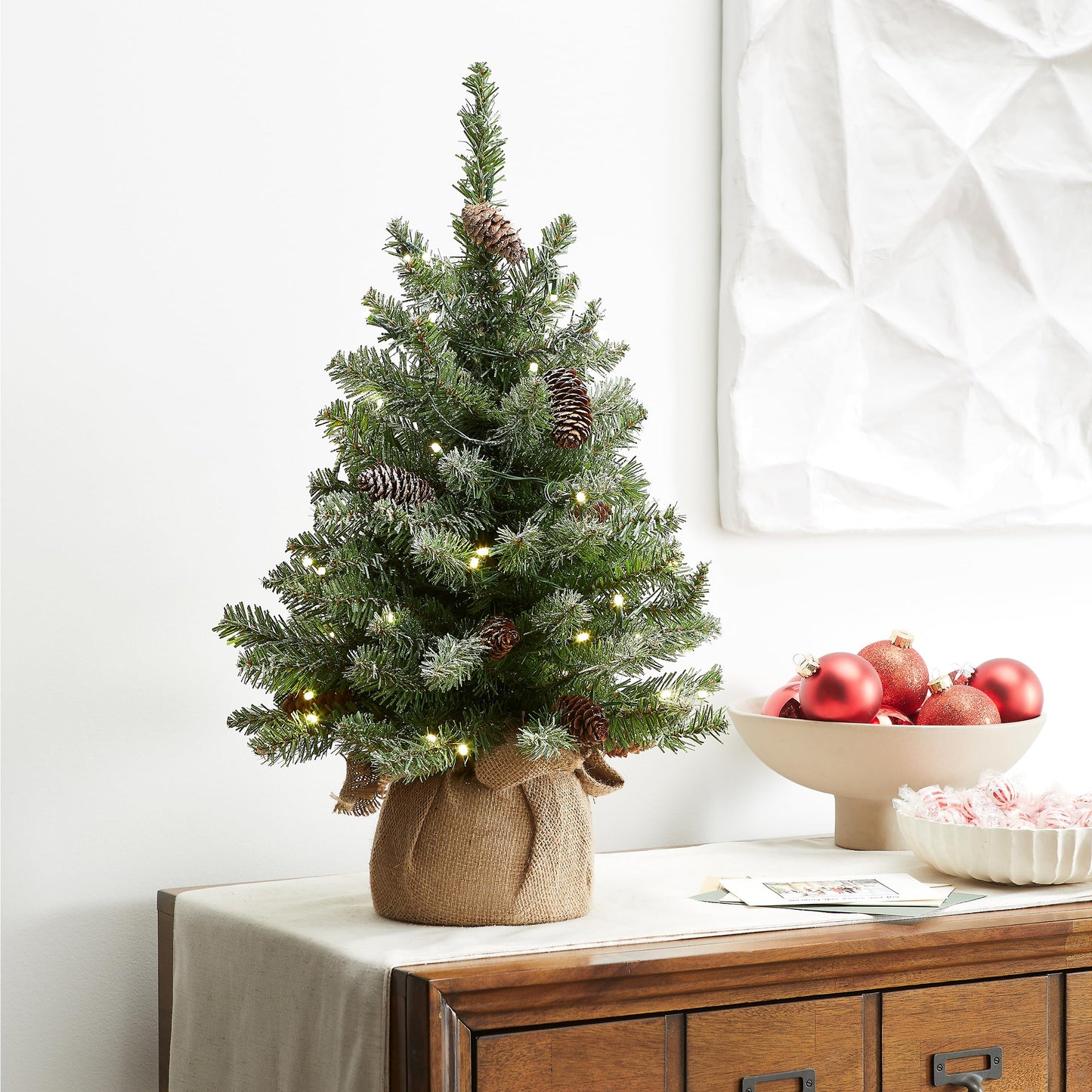 National Tree Company 2 ft Pre-Lit Flocked Mini Artificial Christmas Tree, 50 Clear LED Lights, 75 Tips, Pinecones, Burlap Base, Timer, Green