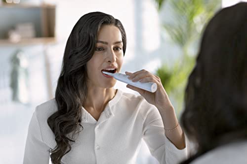 Philips Sonicare 4100 Rechargeable Electric Toothbrush, with Pressure Sensor, 2 Intensity Settings, SmarTimer and QuadPacer, 14-Day Battery Life, Deep Pink, Model HX3681/26