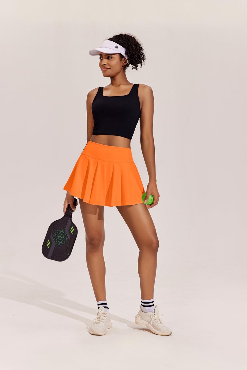 PINSPARK Womens Golf Skort with Pockets Shorts Breathable Tennis Skort High Waisted Pickleball Skirt, Orange Small