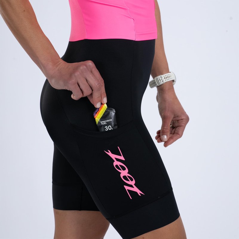 Zoot Women’s Core Tri Aero FZ Racesuit, Short Sleeve Moisture-Wicking Triathlon Suit, Plush Chamois & Race Day Storage - Bright Pink - Large