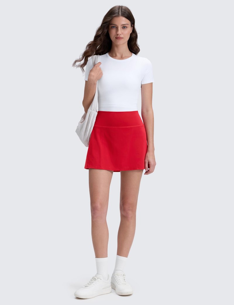 CRZ YOGA Butterluxe High Waisted Tennis Skirts for Women - Mini Lined A Line Golf Casual Skort with Inner Pockets Aurora Red Medium