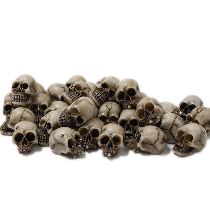 BinaryABC Mini Skull Figurine Miniature Skeleton Head Table Decor,Halloween Micro Landscape Figure,Halloween Prank Props,Haunted Dollhouse Accessories,20PCS