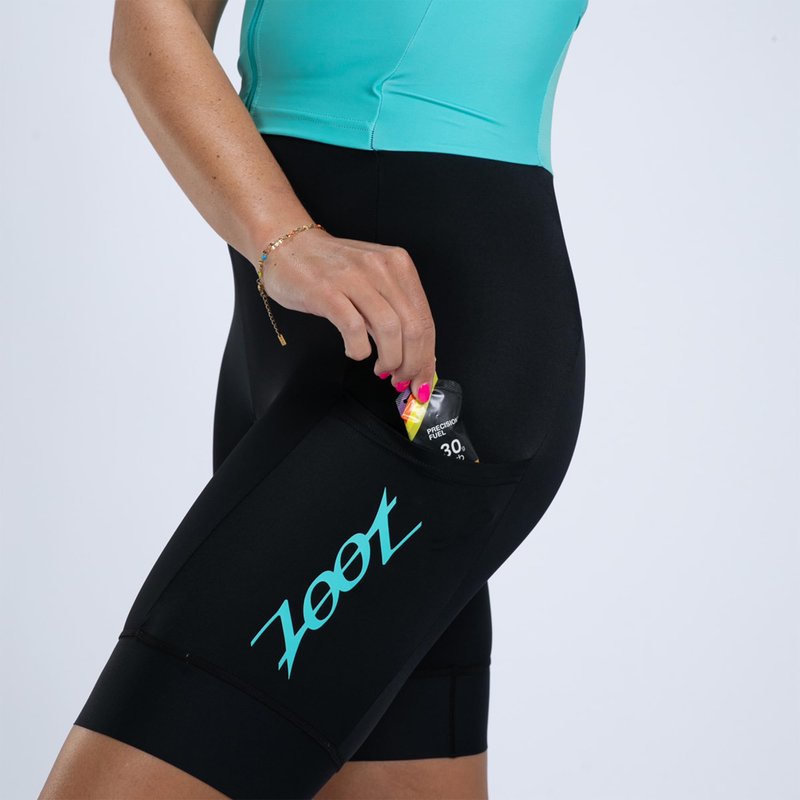 Zoot Women’s Core Tri Aero FZ Racesuit, Short Sleeve Moisture-Wicking Triathlon Suit, Plush Chamois & Race Day Storage - Aqua Blue - X-Small
