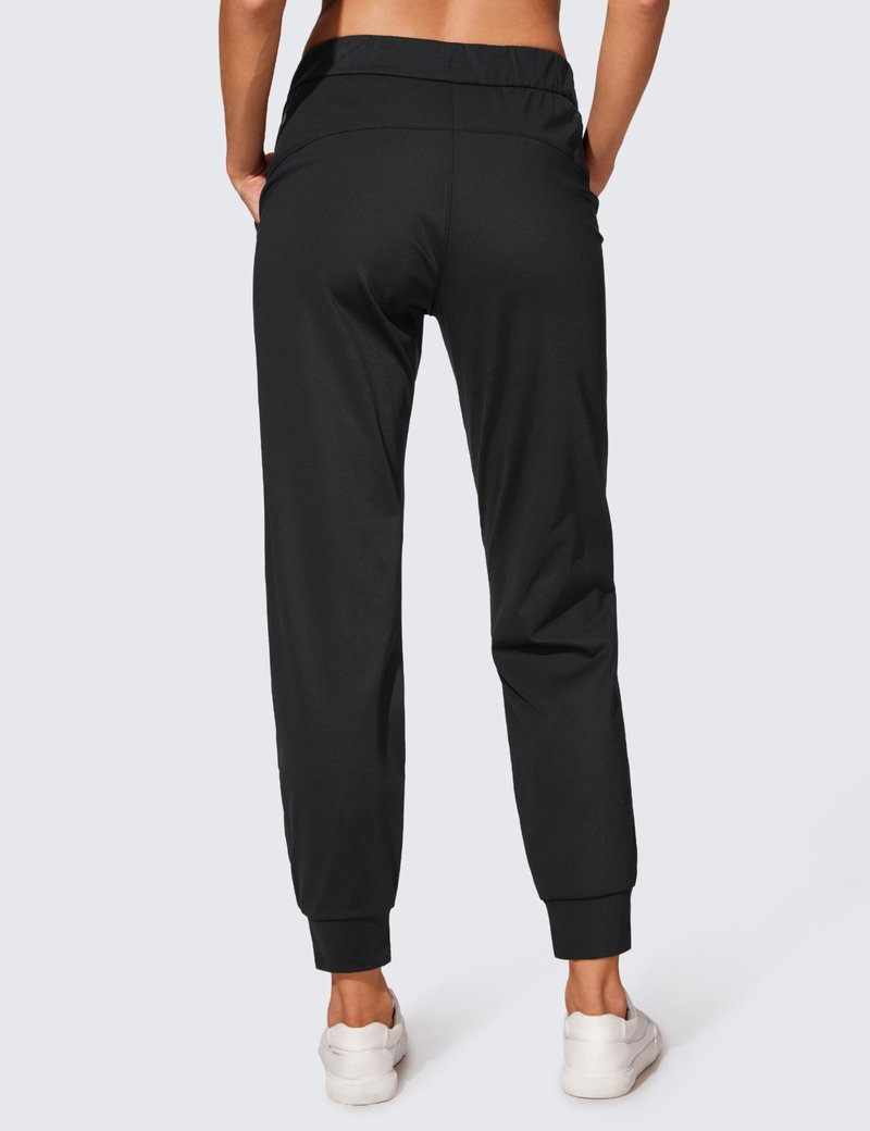 CRZ YOGA 4-Way Stretch Workout Joggers for Women 28" Casual Travel Lounge Athletic Pants with Pockets Black Medium