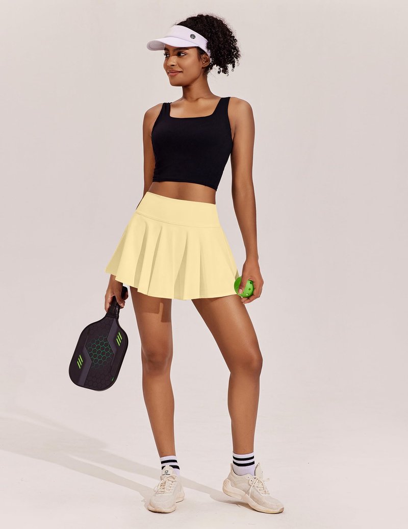 PINSPARK Athletic Skirts for Women Pleated Tennis Skort with Pockets Mini Pickleball Skirt Stretchy Sports Skirts, Butter Yellow XL
