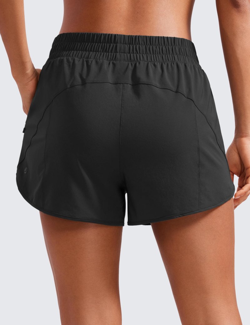 CRZ YOGA Dolphin Athletic Shorts for Women 3" - High Waisted Quick Dry for Running Workout Gym Track with Zip Pocket Dark Lavender Purple Small