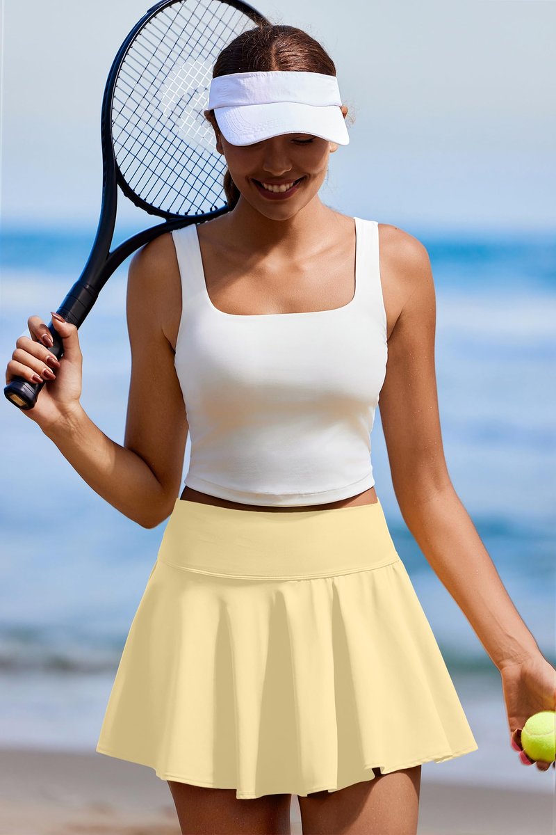 PINSPARK Athletic Skirts for Women Pleated Tennis Skort with Pockets Mini Pickleball Skirt Stretchy Sports Skirts, Butter Yellow XL