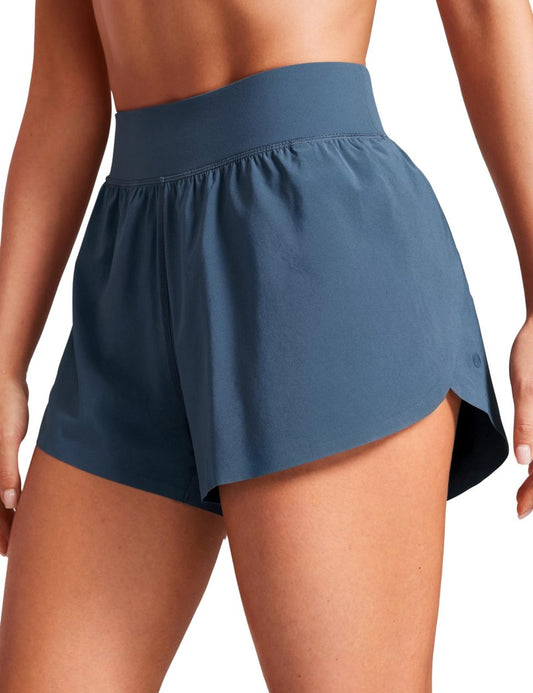 CRZ YOGA High Waisted Dolphin Athletic Running Shorts for Women 3" High Split Comfy Mesh Liner for Gym Workout Track Stelindigo Large