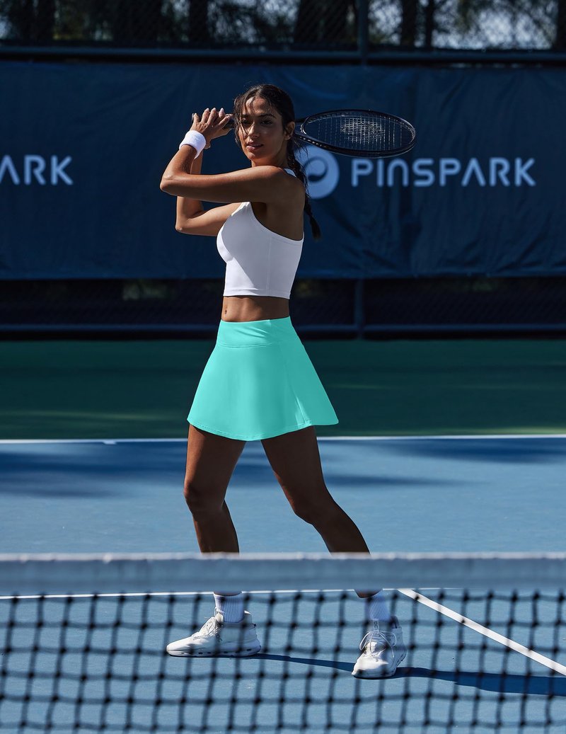 PINSPARK Pleated Tennis Skirt with Pockets Athletic Skort Women for Golf Pickleball Workout Tummy Control,Turquoise Medium