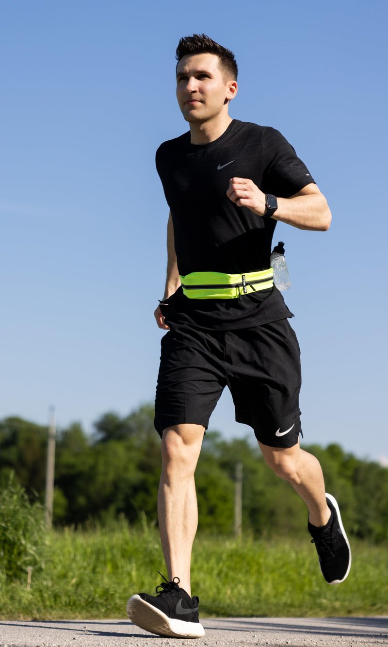 Fitgriff® Running Belt for Men & Women - Secure Jogging Pouch for Phone, Keys & Essentials - For All Cell Phones (Neon Yellow, 33.5" - 47.5" Waist Size)