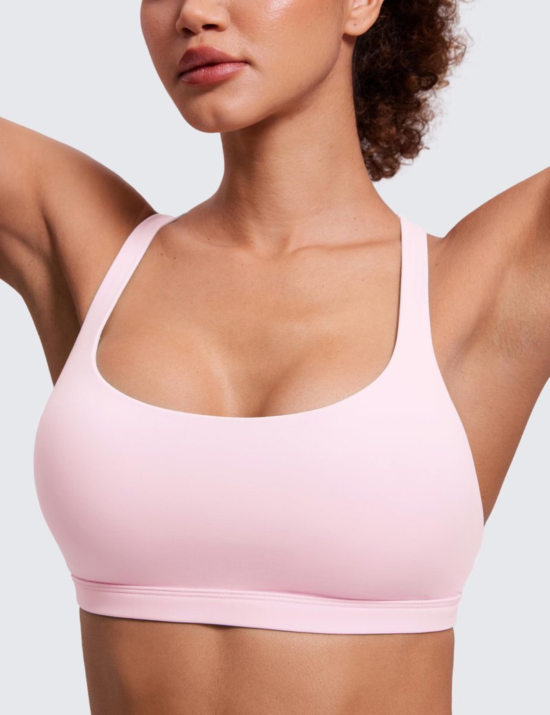 CRZ YOGA Naked Feeling Strappy Sports Bras for Women - Criss Cross Back Wireless Padded Cami Yoga Workout Top Strawberry Pink Small