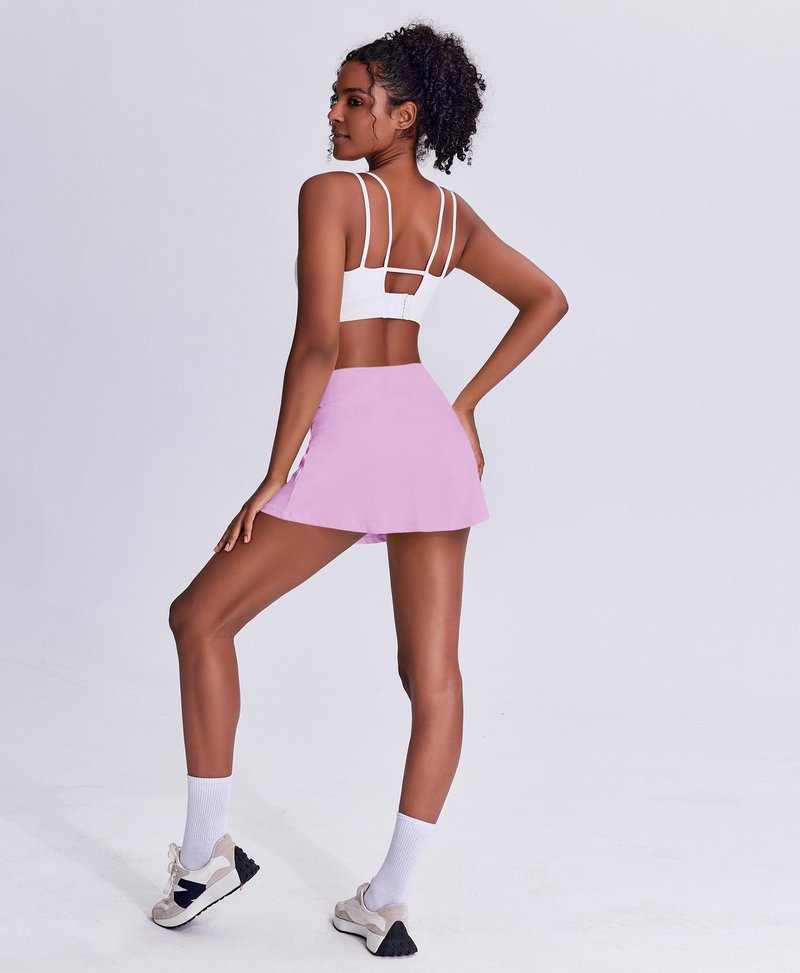 PINSPARK Tennis Skirts for Women UPF 50+ Golf Skirt Lightweight Athletic Skort with Pockets Flowy Pickleball Skorts, Light Pink Small