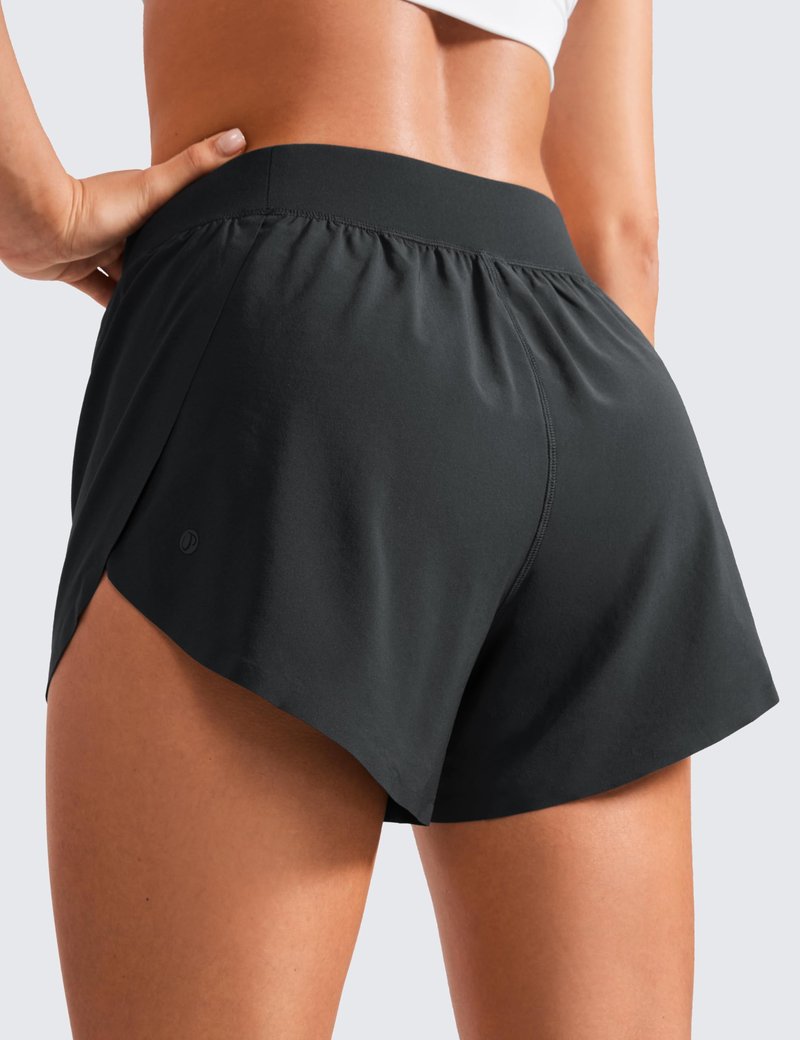 CRZ YOGA Mid Waisted Split Running Shorts for Women 4" - Comfy Mesh Liner for Workout Athletic Gym Track Quick Dry Black Medium