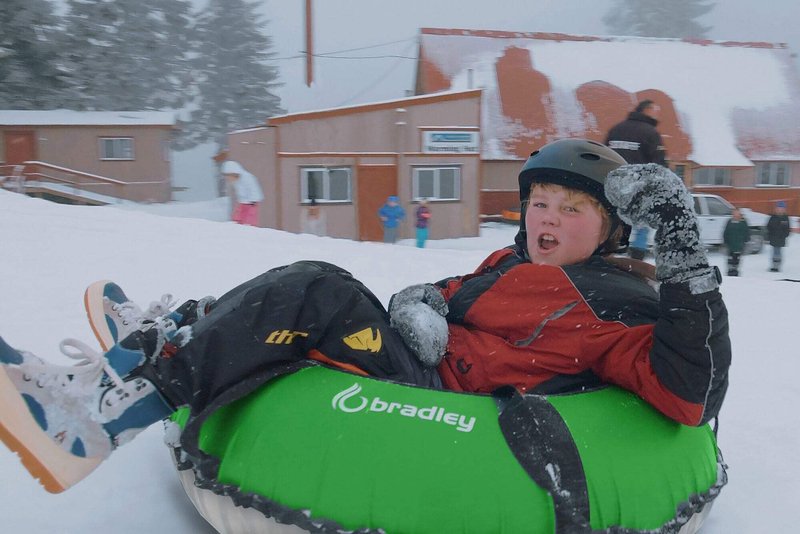 Ultimate Towable Snow Tube Sled with Heavy Duty Cover | Designed for Thrilling Winter Adventures | Made in the USA for Durability and Safety on Snowy Slopes