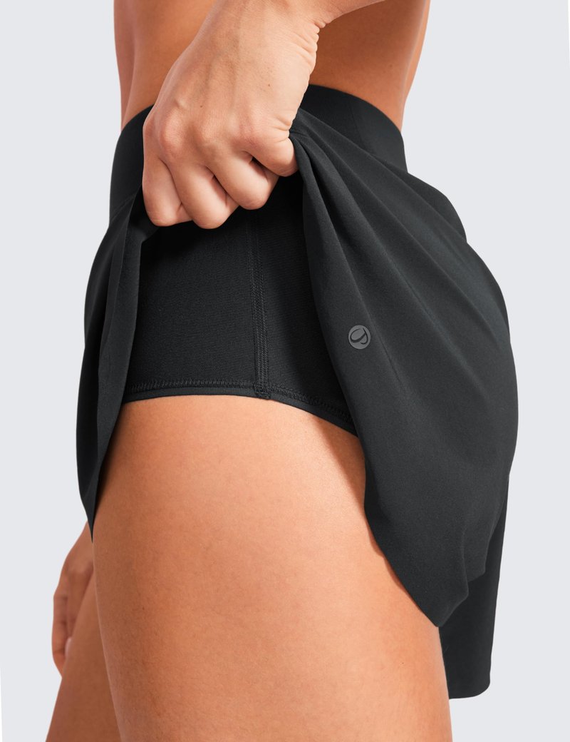CRZ YOGA Mid Waisted Split Running Shorts for Women 4" - Comfy Mesh Liner for Workout Athletic Gym Track Quick Dry Black Medium