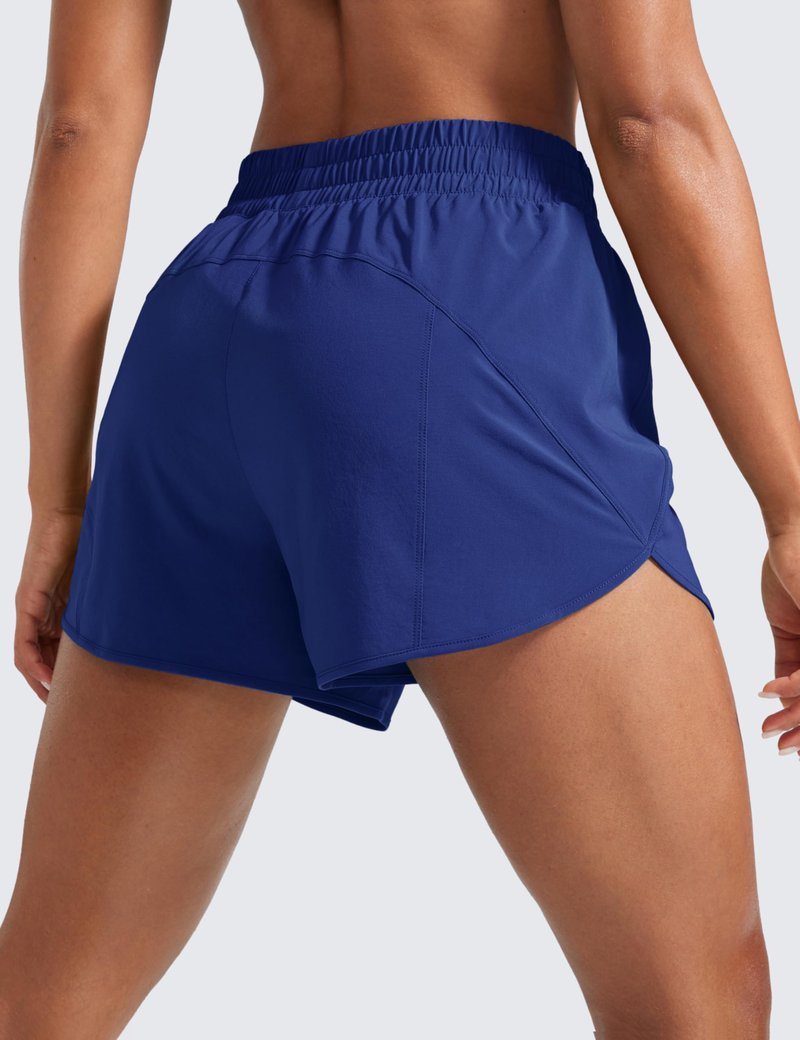 CRZ YOGA Dolphin Athletic Shorts for Women 3" - High Waisted Quick Dry for Running Workout Gym Track with Zip Pocket Larkspur Blue Large