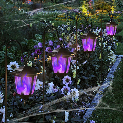 Dynaming 4 Pack Solar Halloween Flame Hanging Lights Outdoor, Flickering Flame LED Garden Lanterns with 4x38 Inch Shepherd Hooks, Landscape Lighting Waterproof for Lawn Yard Pathway Driveway, Purple