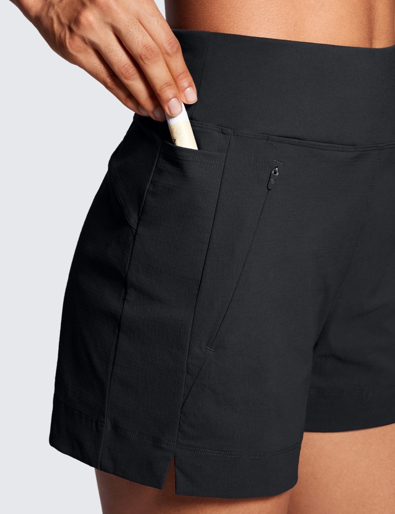 CRZ YOGA Women's Lightweight Mid Rise Hiking Shorts 4'' - Stretch for Athletic Summer Travel Outdoor Golf with Zip Pockets Black Medium
