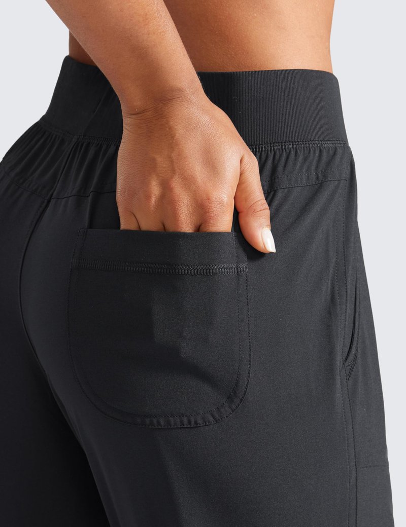 CRZ YOGA Women's Lightweight Workout Joggers 27.5" - Travel Casual Outdoor Running Athletic Track Hiking Pants with Pockets Black Medium
