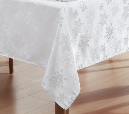 Newbridge Fancy Metallic Snowflake Christmas Fabric Tablecloth, 60 x 84 Inch Rectangle, White Silver, No-Iron Soil Resistant Sparkling Snowflakes Woven Holiday Table Cover