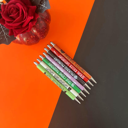 Jxueych 7Pcs Halloween Weekday Pens Glitter Pen with Funny Sayings Vibrant Passive Fancy Ballpoint Pens Cute Gifts for Colleagues Office Supplies (Halloween Pen Set)