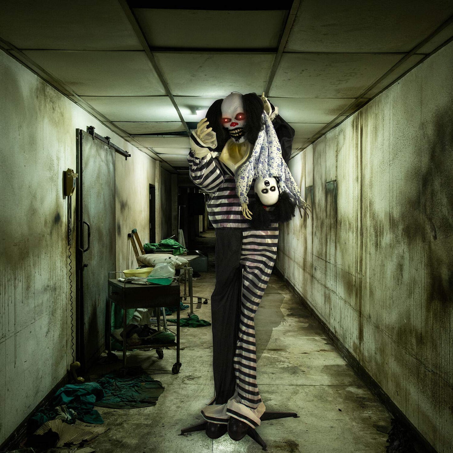 Haunted Hill Farm Life-Size Animatronic Scary Talking Clown with Doll, Motion, Touch Activated Lights, and Sounds, Indoor or Covered Outdoor Halloween Decorations, Battery Operated Halloween Props