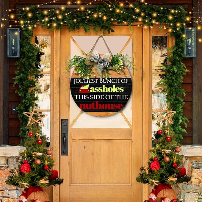 Christmas Door Sign Jolliest Bunch of A-holes Door Sign Funny This Side of The Nuthouse Round Wooden Sign with Bow Wreath Merry Christmas vacation Theme Door Hanging signs for Front Door