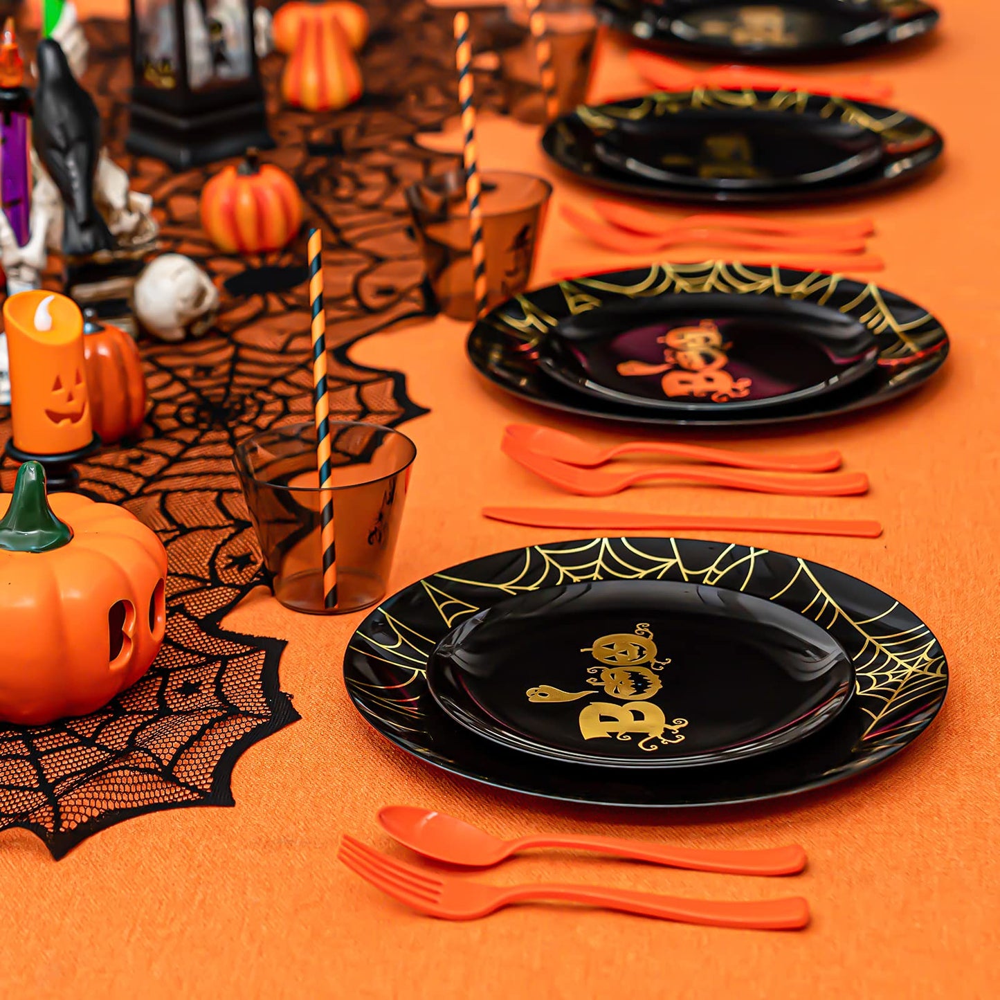 ISFANGCO 150PCS Plastic Spoof Black Dinnerware Set for 25 Guests with Gold Spider Web & Smiley Pumpkin,Heavy Duty Plastic Orange Disposable Cutlery,Gold Witch Printed Black Cups