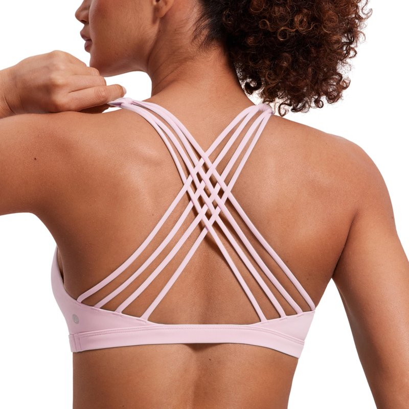 CRZ YOGA Naked Feeling Strappy Sports Bras for Women - Criss Cross Back Wireless Padded Cami Yoga Workout Top Strawberry Pink Small