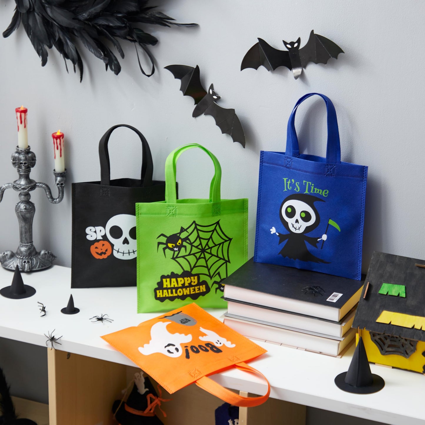 JOYIN 24PCS Halloween Non-Woven Treat Bags, 9" Goodie Totes Bags with Handles, Halloween Candy Bag for Kids Trick or Treating, 6 Cute Designs Gifts Goody Bag Bulk for Classroom Party Favor Supplies