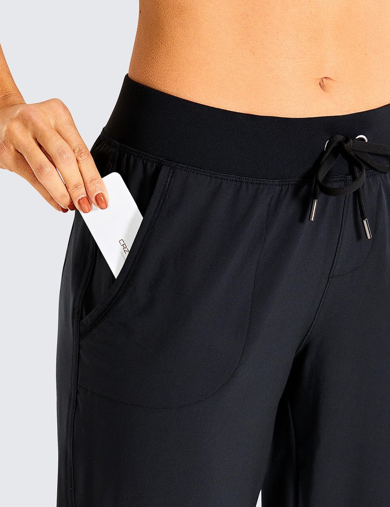 CRZ YOGA Women's Lightweight Workout Joggers 27.5" - Travel Casual Outdoor Running Athletic Track Hiking Pants with Pockets Black Medium