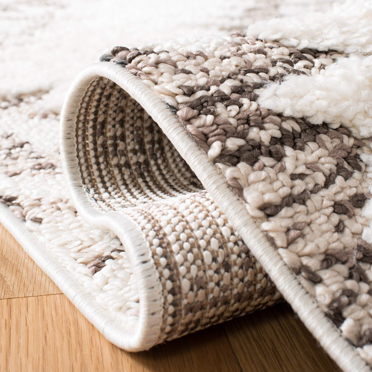 SAFAVIEH Moroccan Tassel Shag Collection Area Rug - 6'7" x 9'2", Ivory & Brown, Boho Design, Non-Shedding & Easy Care, 2-inch Thick Ideal for High Traffic Areas in Living Room, Bedroom (MTS652A)