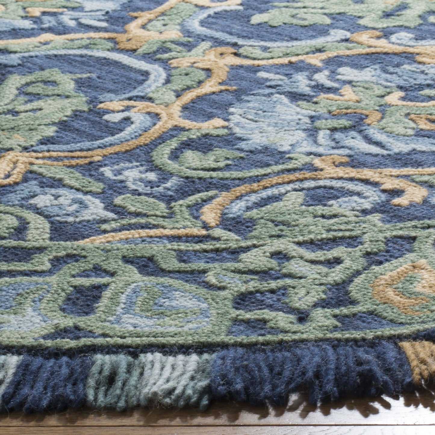 SAFAVIEH Blossom Collection Area Rug - 4' Round, Navy & Green, Handmade Boho Fringe Wool, Ideal for High Traffic Areas in Living Room, Bedroom (BLM422A)