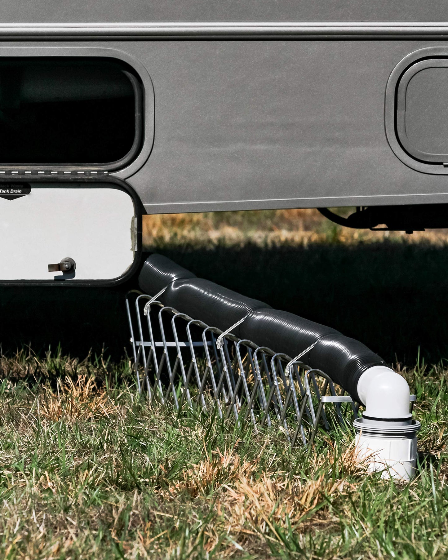 Camco RV Sewer Kit - Features Pre-Attached Fittings, a 10-Foot Sewer Hose, Translucent Sewer Elbow with 4-in-1 Adapter, and More (39551)