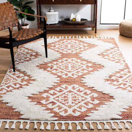 SAFAVIEH Moroccan Tassel Shag Collection Area Rug - 5'3" x 7'6", Orange & Ivory, Boho Design, Non-Shedding & Easy Care, 2-inch Thick Ideal for High Traffic Areas in Living Room, Bedroom (MTS652P)