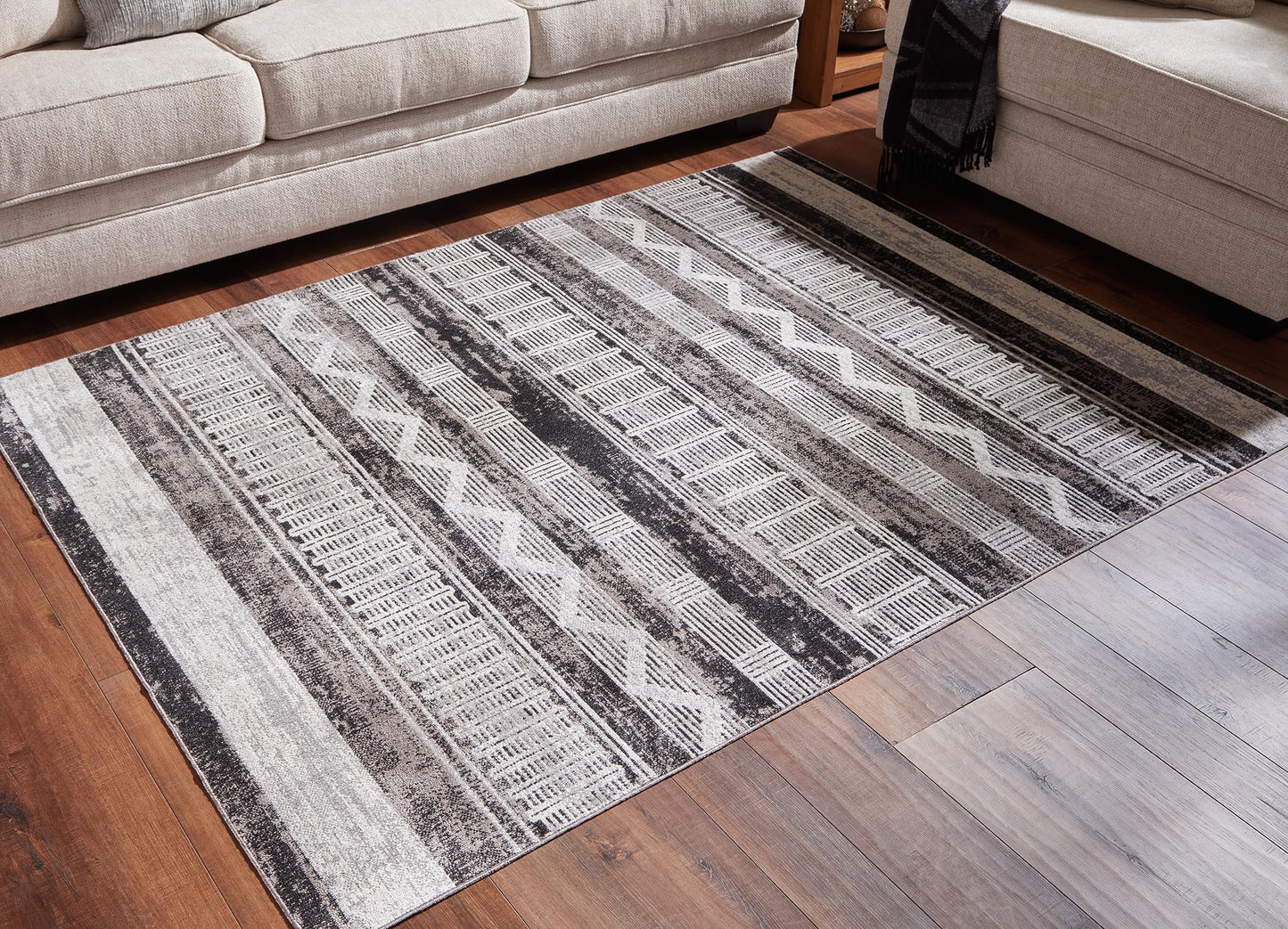 Signature Design by Ashley Henchester Contemporary 5' x 7' Machine Woven Tribal Pattern Medium Area Rug, Low Pile, Machine Washable, Multicolor