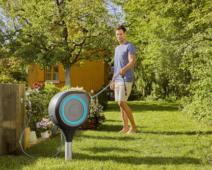 GARDENA 18614-80 | 66' x 1/2" Automatic Retractable Garden Hose Reel on Metal Spike, Outside Garden Hose with 360° swivel Rotation to Reach All Areas of Your Yard. Relocate Hose Reel Easily